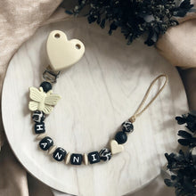 Lade das Bild in den Galerie-Viewer, Schnullerkette mit Namen Mädchen Silikon schwarz beige Leomuster