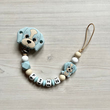 Lade das Bild in den Galerie-Viewer, Schnullerkette mit Namen Silikon Hund beige hellblau